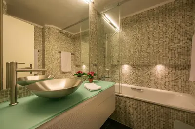 Ein Badezimmer in der Unterkunft Chalet Primula Penthouse