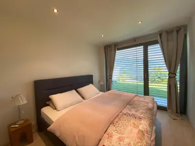 Ein Bett oder Betten in einem Zimmer der Unterkunft bnb Valais - by La Sittelle