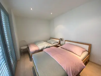 Ein Bett oder Betten in einem Zimmer der Unterkunft bnb Valais - by La Sittelle