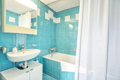 Ein Badezimmer in der Unterkunft Duplex de charme au cœur de la vieille ville de Sion