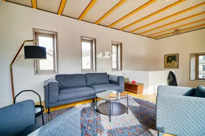 Ein Sitzbereich in der Unterkunft Duplex de charme au cœur de la vieille ville de Sion