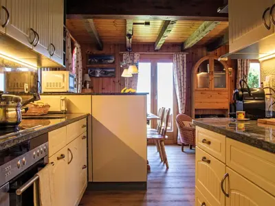 Küche/Küchenzeile in der Unterkunft Chalet Mirabeau 8 by Interhome
