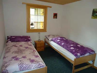 Ein Bett oder Betten in einem Zimmer der Unterkunft Chalet Erika