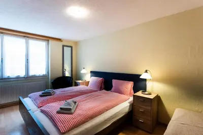 Ein Bett oder Betten in einem Zimmer der Unterkunft Hotel Weisses Kreuz