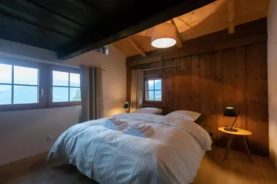 Ein Bett oder Betten in einem Zimmer der Unterkunft La Grande Maison