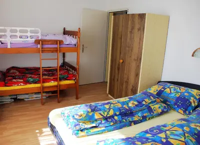 Ein Bett oder Betten in einem Zimmer der Unterkunft Brissago: Casa Collinetta H