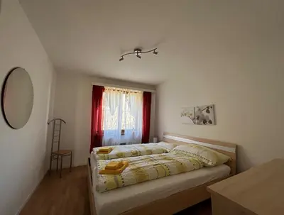Ein Bett oder Betten in einem Zimmer der Unterkunft Brissago: Casa Collinetta H