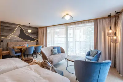 Ein Sitzbereich in der Unterkunft Resort La Ginabelle