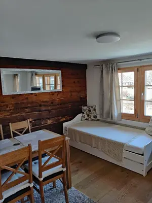 Ein Bett oder Betten in einem Zimmer der Unterkunft Little Chalet Pirelli 1783