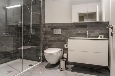 Ein Badezimmer in der Unterkunft Apartment JungfrauCenter Roteflue - GRIWA RENT