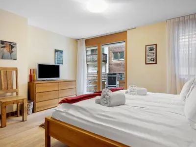 Ein Bett oder Betten in einem Zimmer der Unterkunft Apartment Rütschi-9 by Interhome