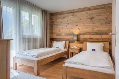 Ein Bett oder Betten in einem Zimmer der Unterkunft Apartment Mühlegaden - GRIWA RENT AG