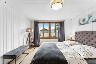 Ein Bett oder Betten in einem Zimmer der Unterkunft App. Seeblick Top of Interlaken