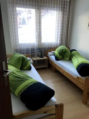 Ein Bett oder Betten in einem Zimmer der Unterkunft Haus Opal,Wohnung 21