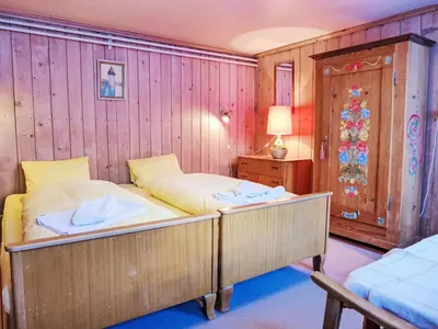 Ein Bett oder Betten in einem Zimmer der Unterkunft Apartment Chalet Chilchboden by Interhome
