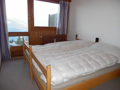 Ein Bett oder Betten in einem Zimmer der Unterkunft Apartment in Anzère
