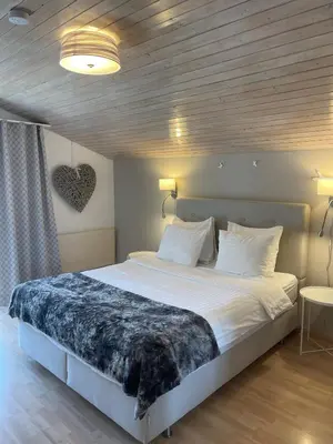 Ein Bett oder Betten in einem Zimmer der Unterkunft S&P Mountain View Apartment 2