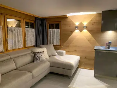 Ein Sitzbereich in der Unterkunft Kirchplatz Apartment Lupus & Cervus