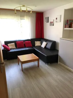 Ein Sitzbereich in der Unterkunft Wohnung Gstein C4
