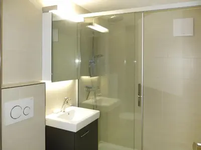 Ein Badezimmer in der Unterkunft Apartment Chalet Desirée by Interhome