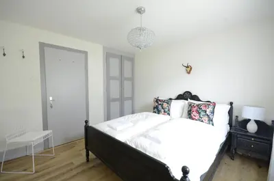 Ein Bett oder Betten in einem Zimmer der Unterkunft Lake House