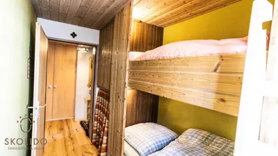 Ein Bett oder Betten in einem Zimmer der Unterkunft Haus Camillo