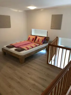 Ein Bett oder Betten in einem Zimmer der Unterkunft Apartment Italy