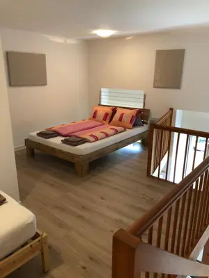Ein Bett oder Betten in einem Zimmer der Unterkunft Apartment Italy