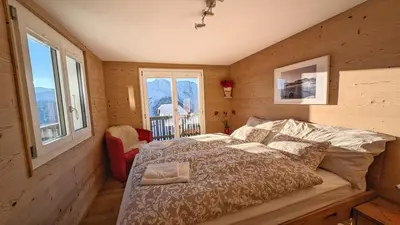 Ein Bett oder Betten in einem Zimmer der Unterkunft Imhof Alpine B&B Apartments