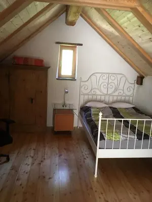 Ein Bett oder Betten in einem Zimmer der Unterkunft Rustico Ca d'Damunt
