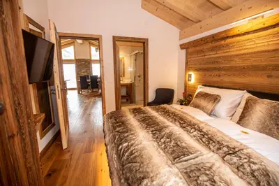 Ein Bett oder Betten in einem Zimmer der Unterkunft Palace Luxury Wellness Apartment and Boutique Hotel Ski-in-out