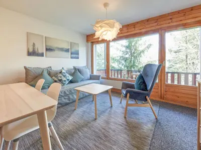 Ein Sitzbereich in der Unterkunft Apartment Hameau D004 by Interhome