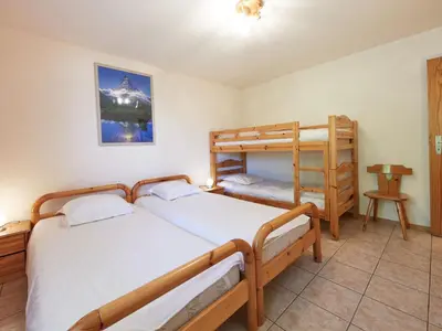 Ein Bett oder Betten in einem Zimmer der Unterkunft Apartment Sérandes 9 by Interhome