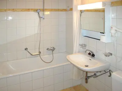 Ein Badezimmer in der Unterkunft Apartment Résidence Dixence-15 by Interhome