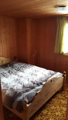 Ein Bett oder Betten in einem Zimmer der Unterkunft LUMA