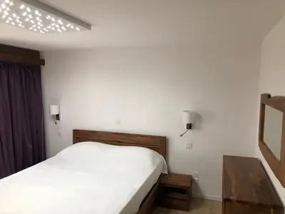 Ein Bett oder Betten in einem Zimmer der Unterkunft Blomatu II Top Floor