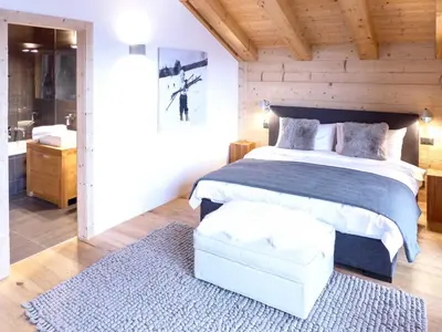 Ein Bett oder Betten in einem Zimmer der Unterkunft Chalet Chalet Astoria by Interhome
