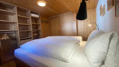 Ein Bett oder Betten in einem Zimmer der Unterkunft Bergquelle 1.OG