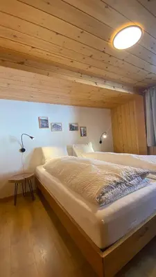 Ein Bett oder Betten in einem Zimmer der Unterkunft Bergquelle 1.OG