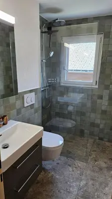 Ein Badezimmer in der Unterkunft Schöne Ferienwohnung Nr.26 im Haus Opal