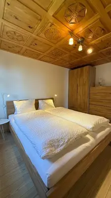 Ein Bett oder Betten in einem Zimmer der Unterkunft am Bärgbach 1.OG