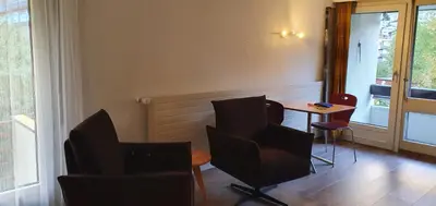 Ein Sitzbereich in der Unterkunft Fortuna 216 und 116