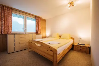 Ein Bett oder Betten in einem Zimmer der Unterkunft Francy - Partial lake view