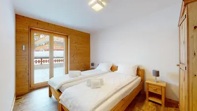 Ein Bett oder Betten in einem Zimmer der Unterkunft Les Mayens MA 002 - LUXURY apartment 6 pers