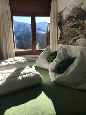 Ein Bett oder Betten in einem Zimmer der Unterkunft Lärchenwald Lodge