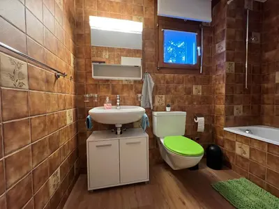 Ein Badezimmer in der Unterkunft Lärchenwald Lodge