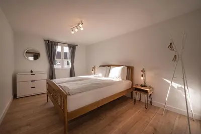 Ein Bett oder Betten in einem Zimmer der Unterkunft 2 Bedroom Mountain View Apartment Interlaken