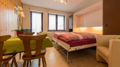 Ein Bett oder Betten in einem Zimmer der Unterkunft Apartments Orphelja
