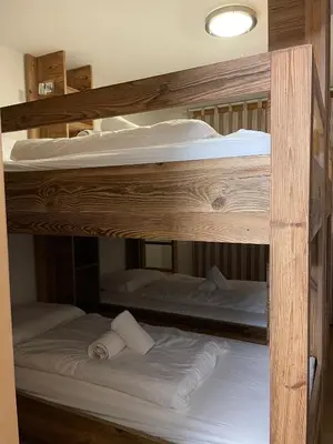 Ein Bett oder Betten in einem Zimmer der Unterkunft Ski-In, Ski-Out 4, Veysonnaz