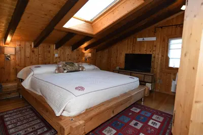 Ein Bett oder Betten in einem Zimmer der Unterkunft Chalet Mon Rêve